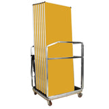 Stack of yellow folding tables on a metal trolley against aa white background