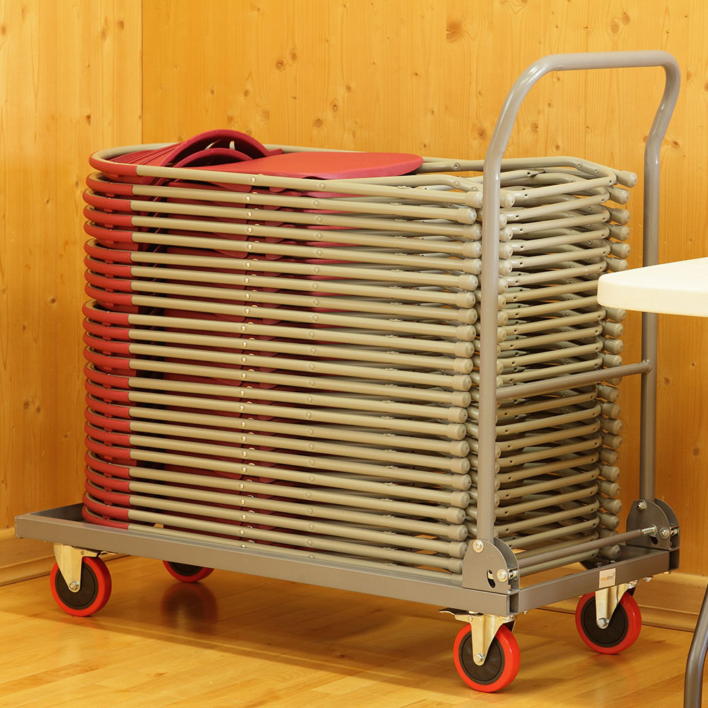 Burgundy fan back plastic folding chairs stacked on chair trolley.