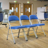 Row of Comfort Deluxe padded folding chairs in community hall.