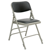 Black padded folding chair with vinyl upholstery.