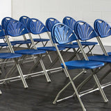 Rows of blue Classic Plus folding chairs.