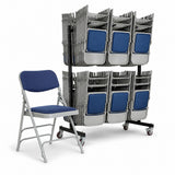 A single folding chair with a blue upholstered seat and back is shown beside a black rolling rack stacked with identical chairs, on a clean white studio background.