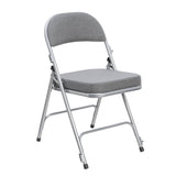 Comfort Deluxe Padded Folding Chair with grey upholstery and silver frame.