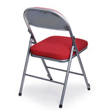 Comfort Deluxe padded folding chair with red upholstery and silver frame, rear profile.