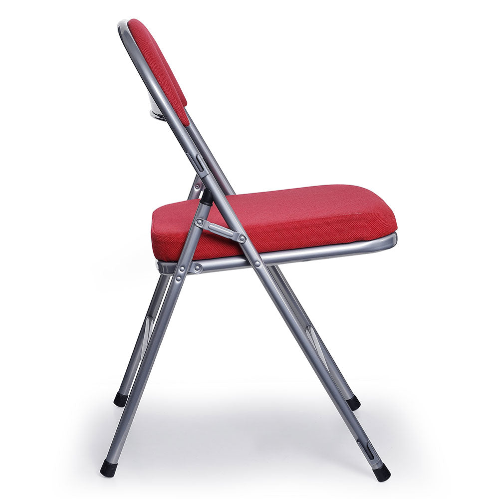 Side profile of Comfort Deluxe padded folding chair with red upholstery and silver frame.