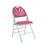 Red padded folding chair with plastic fan back design and light grey frame.