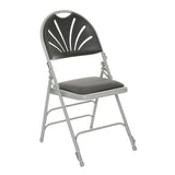 Grey padded folding chair with plastic fan back design.