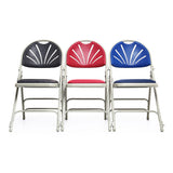 Three padded folding chairs in various colours linked together to form a row.