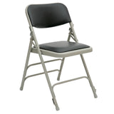 Folding chair with padded seat and back upholstered in black vinyl.