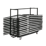 Grey folding exam desks folded away for storage on an exam desk trolley.